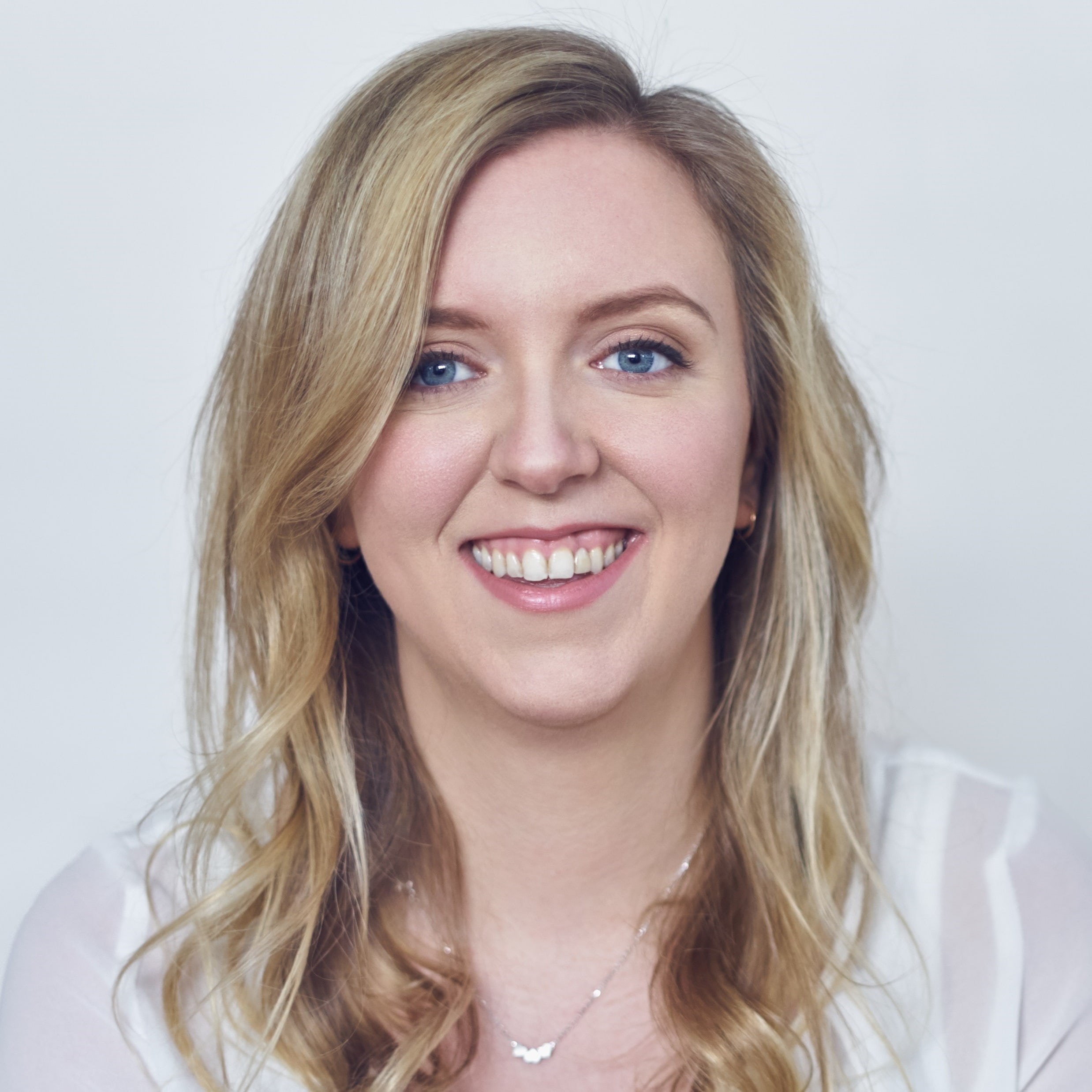 Headshot of Holly Burton, Leadership Coach for Women in Male-Dominated Industries. Photo by Angela McConnell Photography.