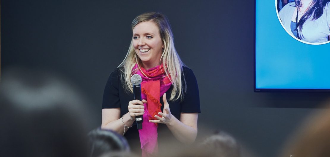 Holly speaks in front of group on how to retain women in STEM