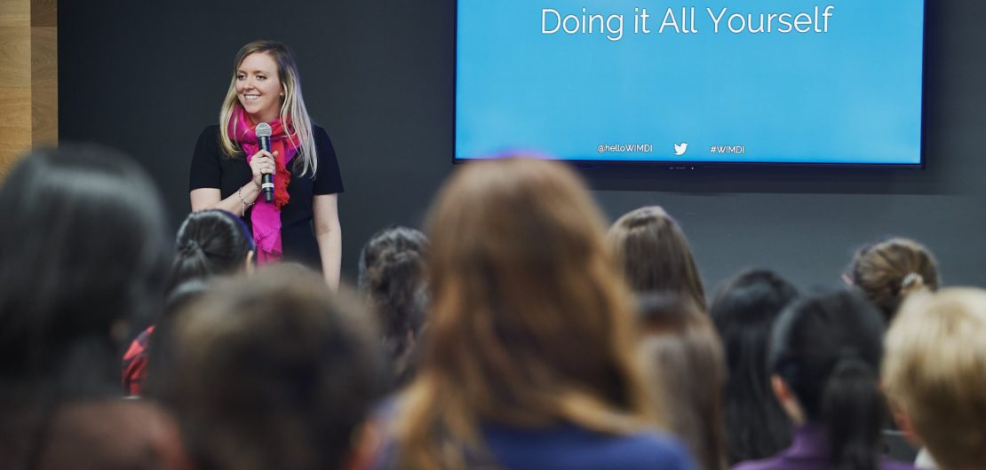 Holly talks to group of professional women about advocating for themselves at work