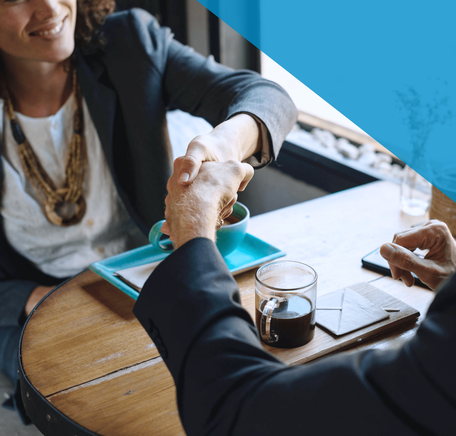 Career coaching | Two people shake hands