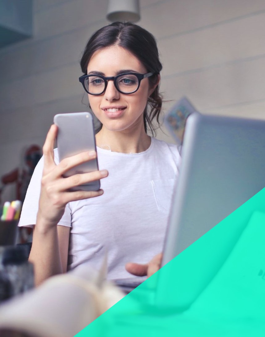 Woman typing an email on her mobile phone.