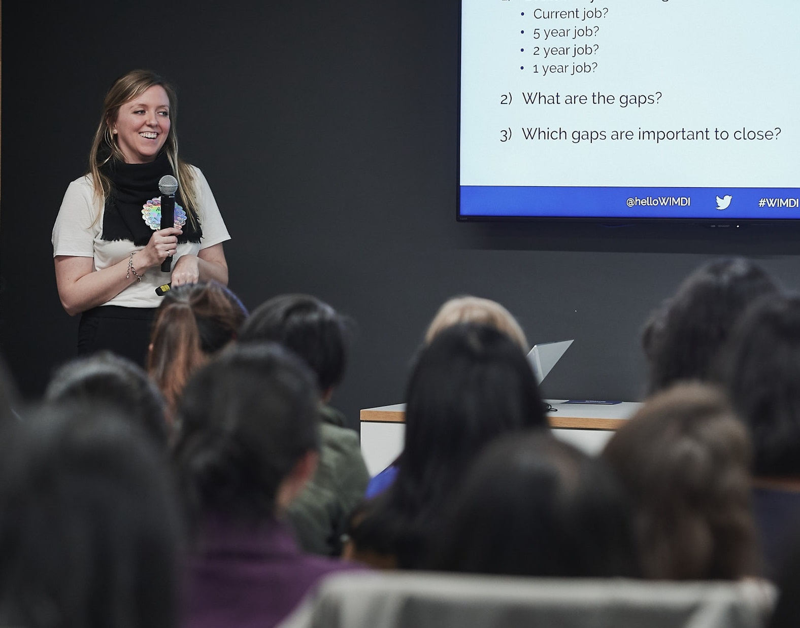 Holly speaks to group about effective salary negotiation | by Vancouver photographer Angela McConnell