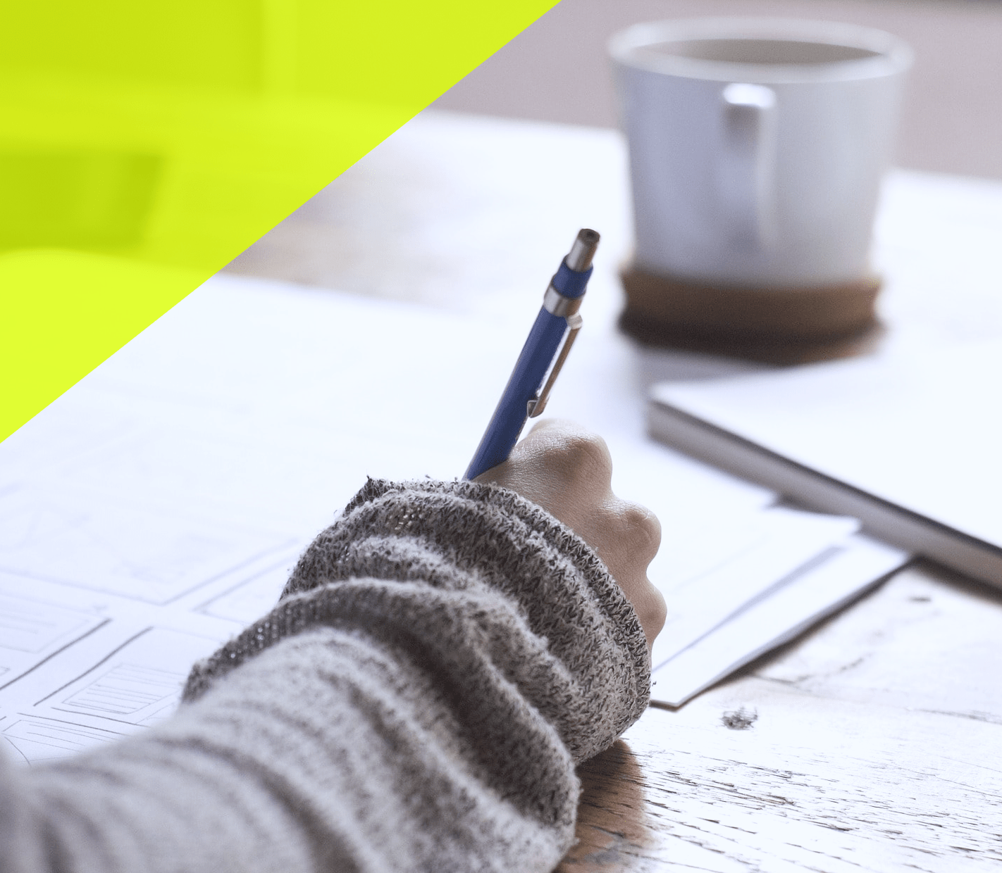 Woman takes notes on her resume - career coaching